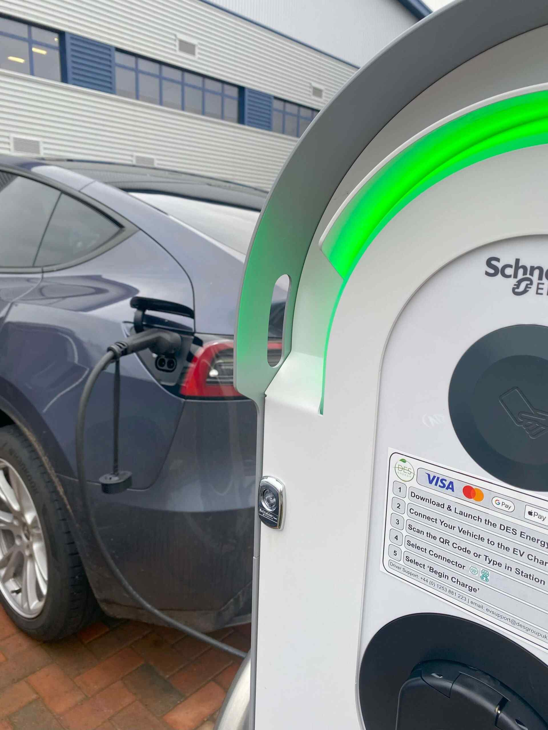 Schneider Electric EV charging point and Tesla